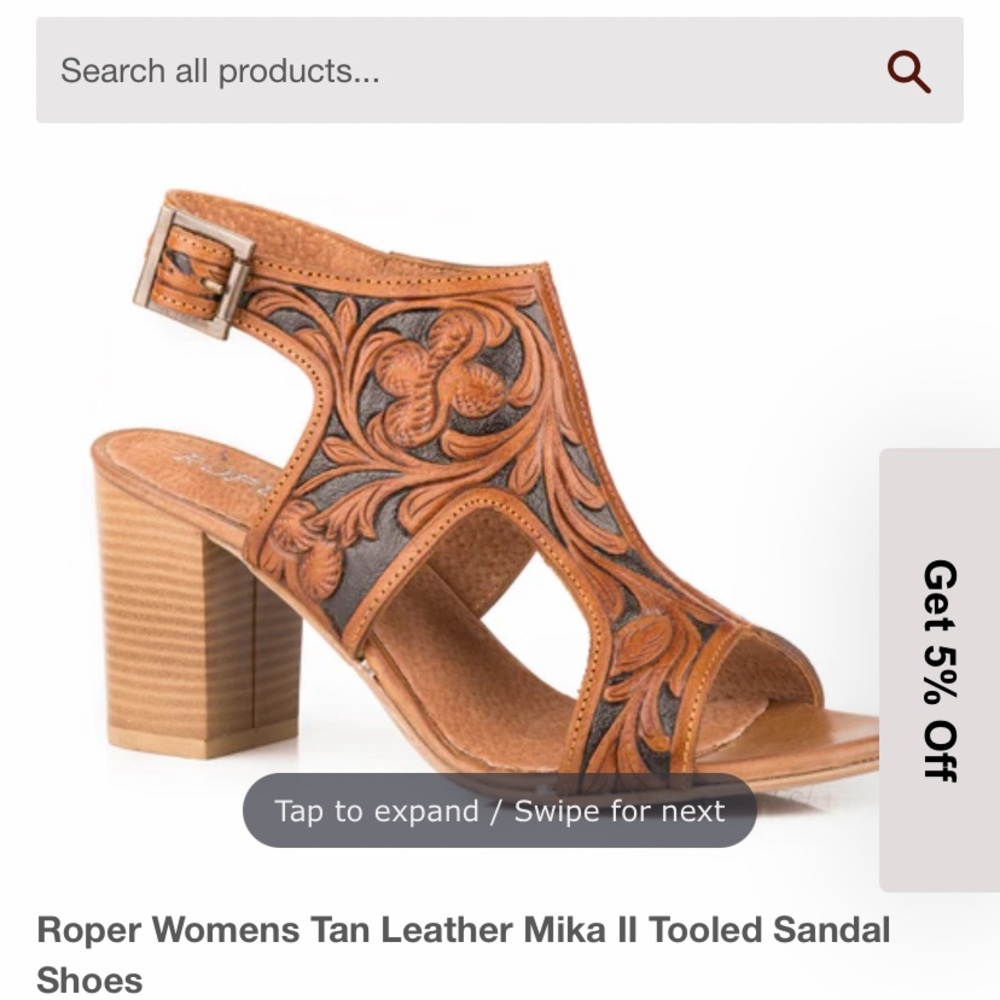 Selling leather tooled heels, never worn were too big. Brand new.